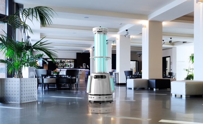 The ADIBOT A1 fully autonomous UV-C disinfection robot disinfecting a hotel lobby.